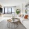 a living room with a white couch and a coffee table