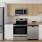 a kitchen with wood and white cabinets